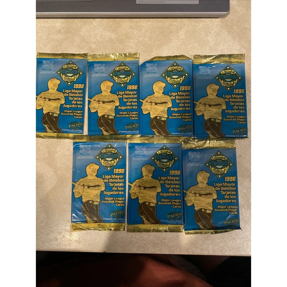 1998 Pacific Nestle Unopened Packs (7). HOF Visible On Back P. Martinez & Others